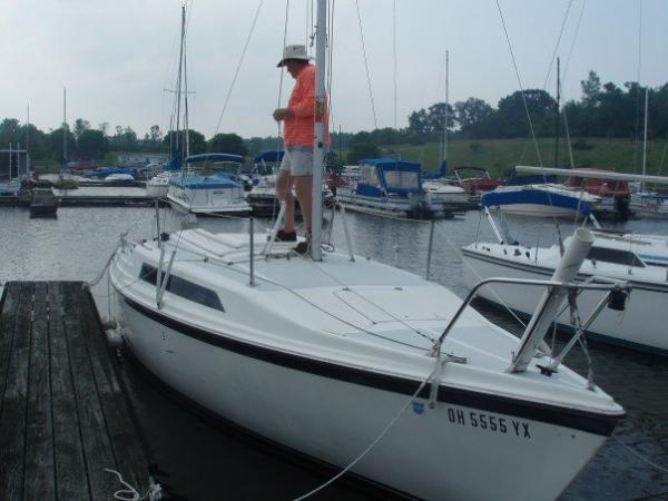 My dad on my grandpa's boat, Cheers, in Ohio.  I'm hoping to buy it and move it to California soon!