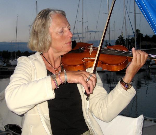 My life partner Hanne, from Denmark, plays her violin at the marina often ....