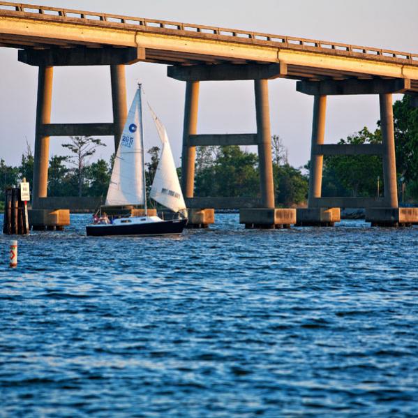 My O'day 23 Coming through the Oriental bridge at sunset.