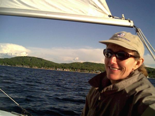 My wife Barbara, on our first sail. Lake Charlevoix, Mi.