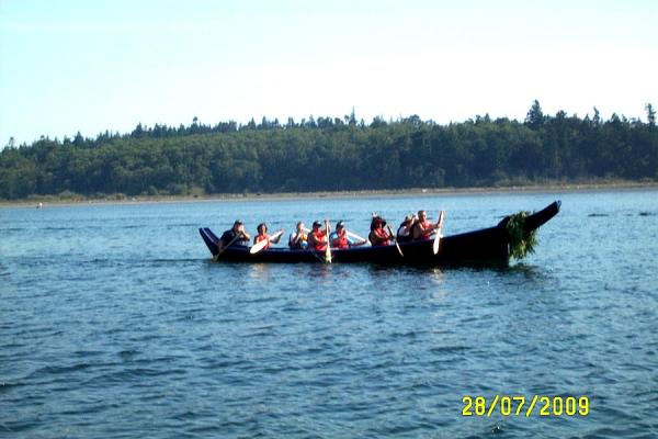 Native Lummi indian canoe race in Lummi Channel just west of Bellimgham WA and Lummi Island . The restrurant at the ferry dock on Lummi island has great pizza and meals with stares to tie your dingy to. There is a local farmers market by the grocery store where some island friends play folk and bluegrass music on Sat in the summer.