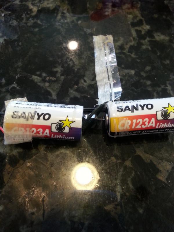 Original batteries were CR123A (Sanyo).