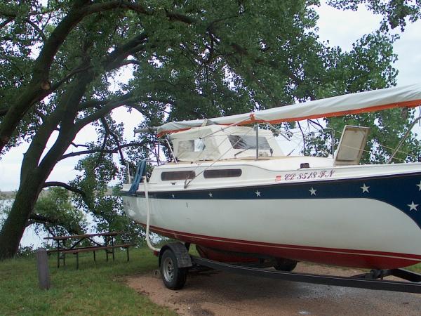 Our first Liberty's Belle was a MacGregor. Dry land camping at Medicine Bow Rec Area in Nebraska.