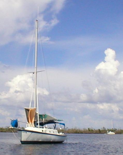 Pelican Bay after new porthole project in heat, August 2004. Another Irwin in the background. It was so hot, we were practically the only boats in the anchorage.