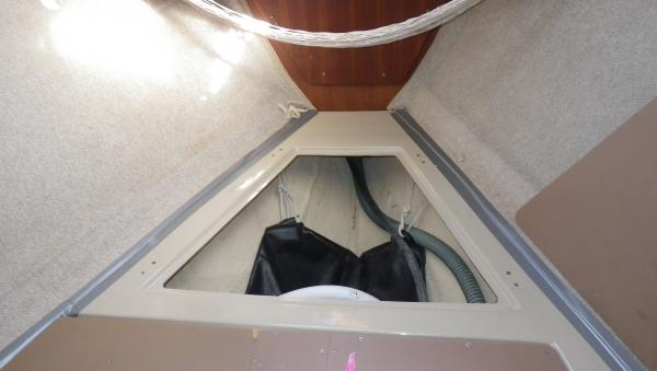 Possible original neoprene holding tank in bow under v berth.