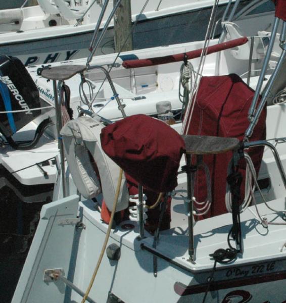 Radiance stern seats apparently were a custom addition to this boat, as I have seen other 272LE's without them. The teak boards have two clamps beneath holding bolting them to the rail, and an extra 22&quot; long, 1&quot; diameter stainless steel stanchion adding support to the rear of each seat.