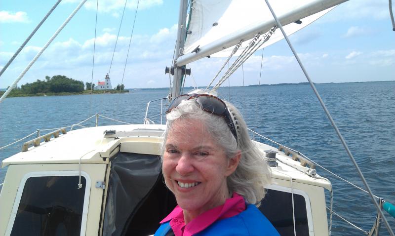 Rebecca sailing toward Strawberry Island Lighthouse