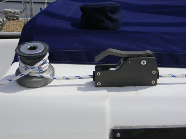 Relocated mast halyard winch and Garhauer rope clutch