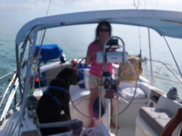 Robin and Charley at the helm