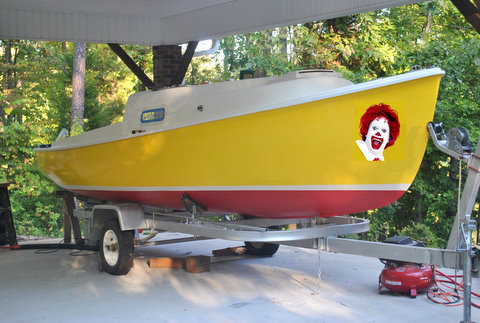 Ronald's boat  - I got so much ribbing over the color choices that I PhotoShopped Ronald's face on the bow in this picture.

My wife insisted on the red bottom -'just in case'