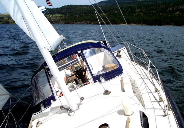 s/v AQUILA heeled near 20* with Catherine piloting during a close haul run.