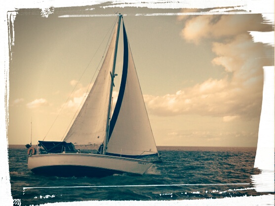 s/v The White Pearl a Catalina 30, reaching along the southern shore of Lake Pontchartrain in S winds 10-15kts.