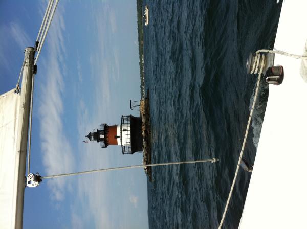 Sailing past the Jamestown lighthouse right after going under the Jamestown bridge (west passage) up the Narragansett bay.  This was Spring Fever's maiden voyage and I went solo from Point Judith pond (Great Island) up to East Greenwich Cove in about 10 hours.