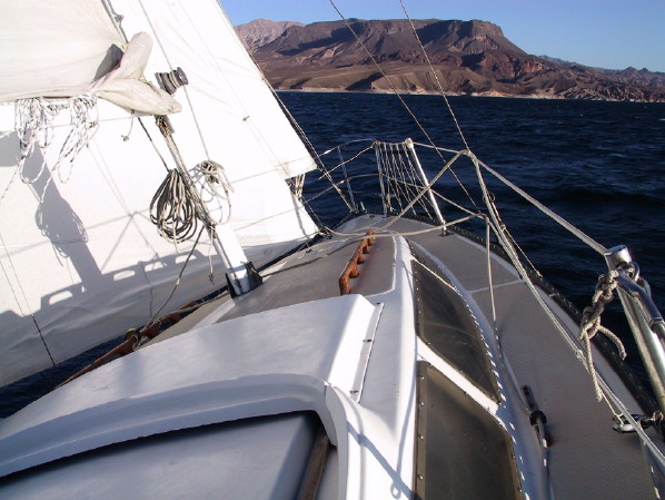 Sailing toward Fortification Hill, Lake Mead, with all three sails up and a reef in mainsail.