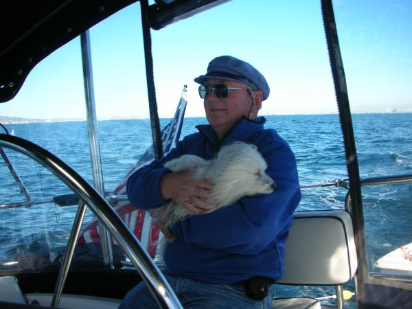 Sailor the boat dog wanted to have a look around. Note we have the full enclosure up. See the backrest I had made for the helm seat.