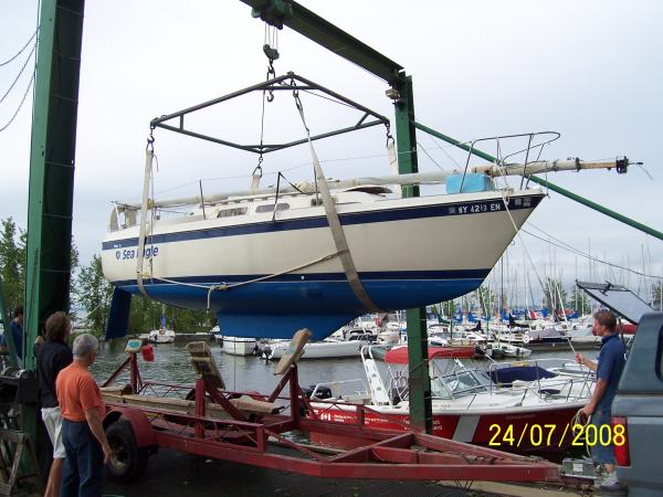 Sea Eagle is lowered into fresh water for the first time at Beaconsfield Yacht Club on lake St. Louis just west of Montreal