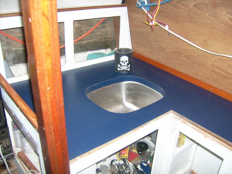 September 2011.  This is Diana's remodelled galley; the lift-out panels are not finished yet and so not in place.  I have since changed the plan for the smaller athwartships bulkhead which will be C44-style drawers.