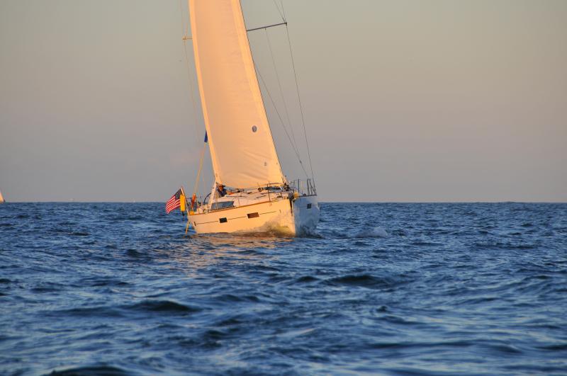 Setting sun reflecting off sails during Harvest moon Regatta 2012