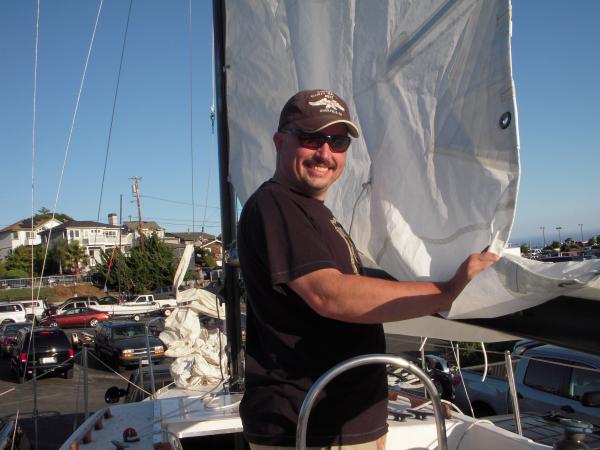 Setting up the mast and mail sail.