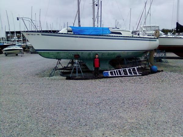 Side view with second mate in front of boat.