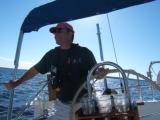 Skipper at the helm