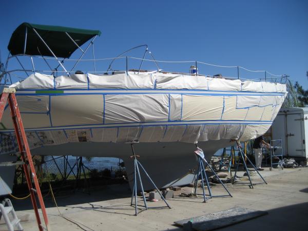 Spent all day friday taping the boat. Boot stripe is 2&quot; and 1&quot; above bottom paint. Top stripe is 2&quot; below toe rail and is 2&quot; wide. Left friday late. Saturday morning, it rained buckets and the boat finally dried sunday. On Monday I had to re-tape and re cover the boat all over again. It better be worth it.