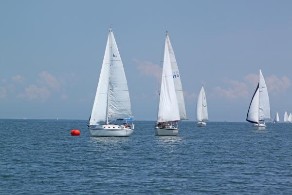 Spring Regatta- Our first race and we won 2nd place. Here we are just rounding the mark ( the genny is on her way around).