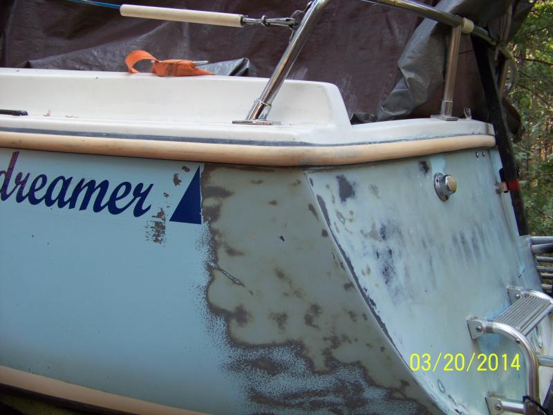 Starting to sand away the old. Sanding with 100 grit on a D/A. Looks like the original color was sea foam green. That is the color I'll put back on.