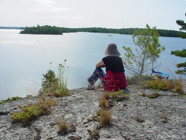 Taking a break from picking blue berries . North Channel, Lake Huron