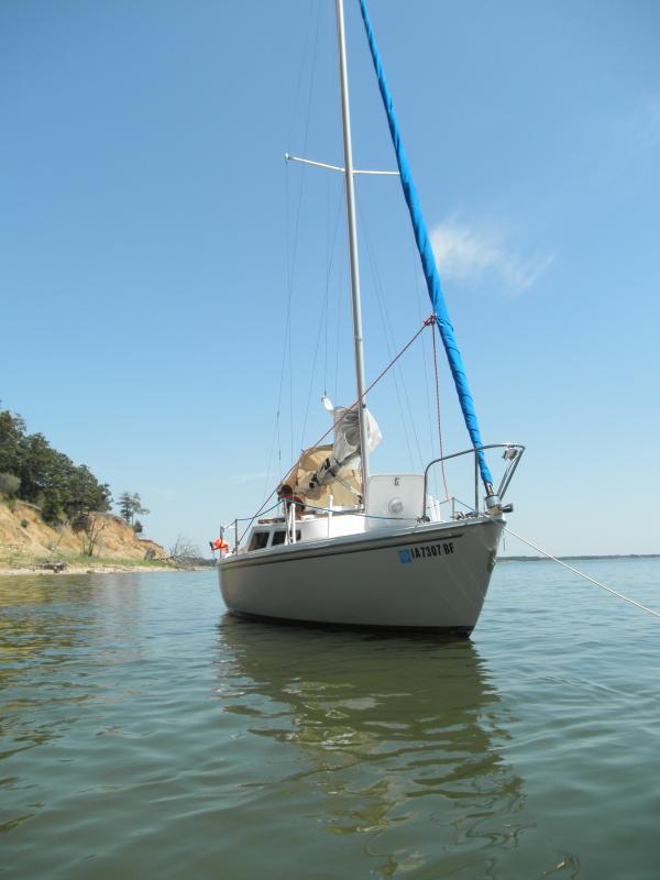 The '22' is a great sized boat to go into the smaller coves. Raise the keel and we can get into water 4 ft deep without a worry. Step off the ladder and stand up.