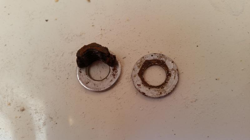 The factory used steel nuts not stainless.  No wonder the bow eye was loose.