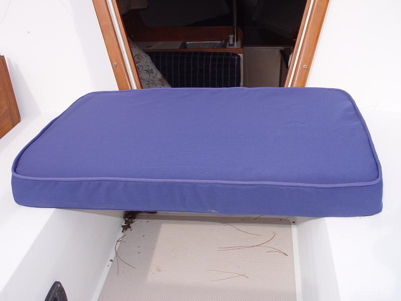 The filler cushion for the V berth after making the new cover.
