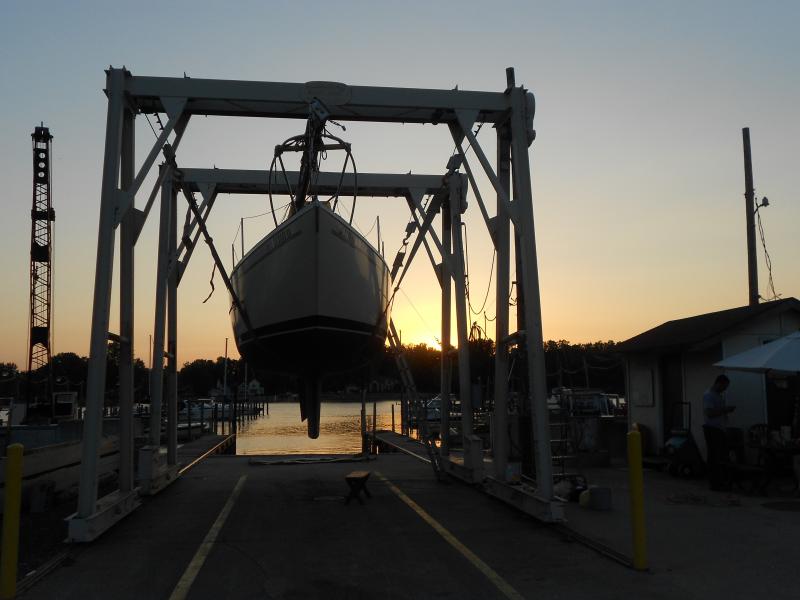 The Kama Hele Kai is hang in the hoist for an early morning launch.