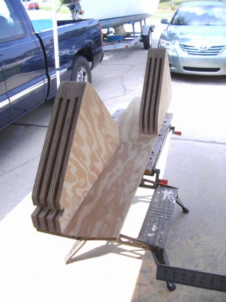 The project took just over 1/2 sheet of plywood.  The assembly is not anchored to the trailer in any way, but cut so that it could be angled in and wedged into place.