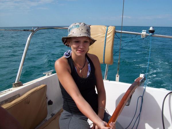 The proud skipper at the helm of her new vessel