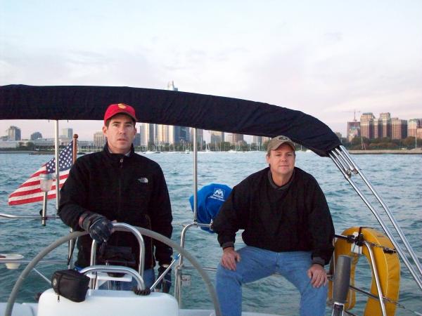 The skipper and one of his faithful crew with the city behind us.