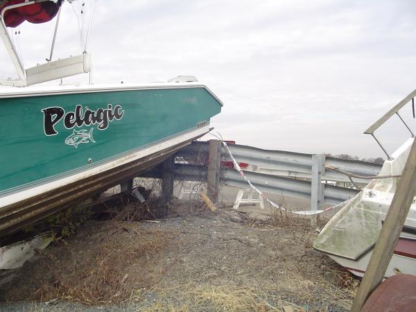 This boat had both outboards stuck on the other side of the guardrail