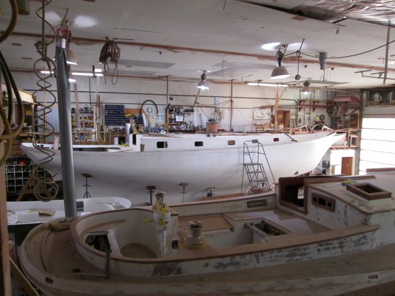 This is C44 no.35, Alliance, as seen from Frolic in the CY shop.  44035 is the first production boat with a fiberglass deck/coachroof; however it appears to be a little too tall and Dave and I decided to revise the molds next time out.

13 Jan 2015