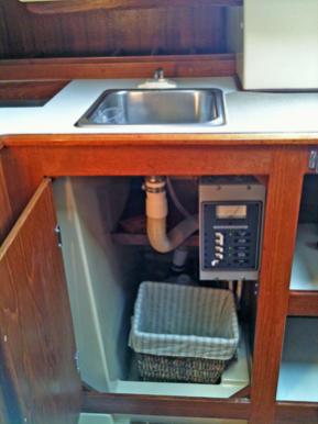 This is NOT the original galley sink fixture, but it works ... and is low profile ... so I re-used it.