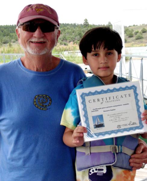 This is really fun. I make up a certificate of training for the sailing kids with a cheering presentation from other sailors in the club. We then also share some good &quot;sweets&quot; This young lad is from Brazil and new very little English. He did understand the ways of of the sailing experience and his honoring ceremony.