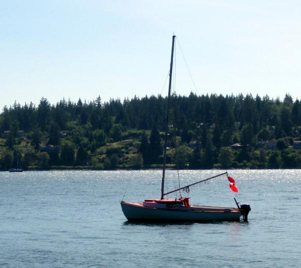 Time O'Day afloat in Drew Harbour,Quadra Island BC on Canada Day 2009. She is #333 and carries me around the Gulf Islands and Desolation Sound area. I get many compliments from people who sail bigger yachts about how good looking and sound she looks. Kind of like her skipper..LOL