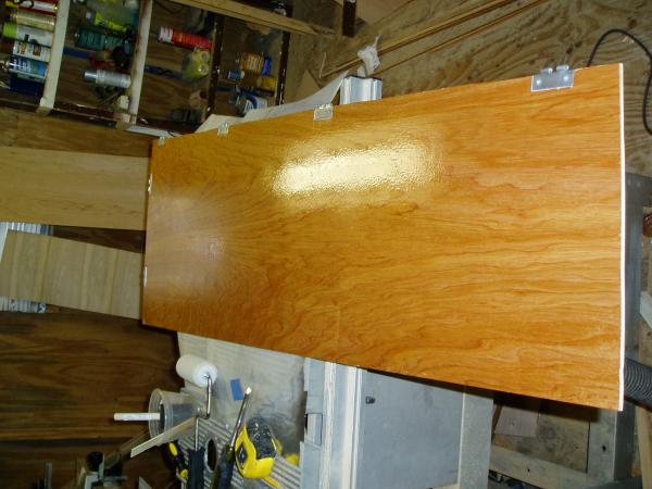 Top of the galley unit being coated with epoxy. Also with recessed hinges for leafs that will lift up for added counter space.