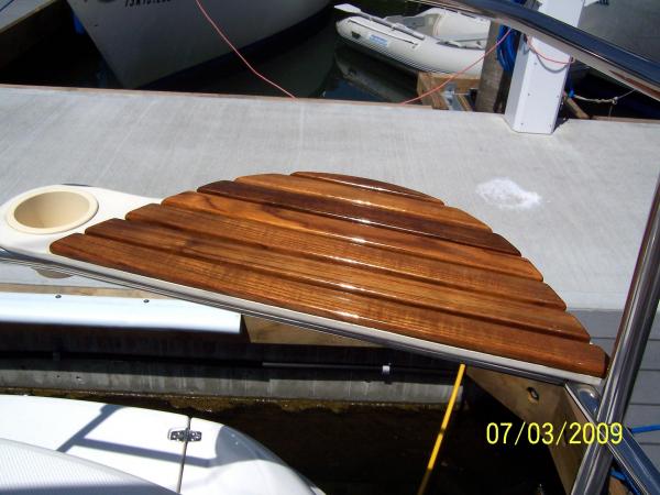 Transom seat with five coats of System Three epoxy and three coats of varnish.