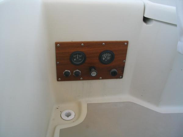 Used a teak board to make a new gage panel for the O'day.