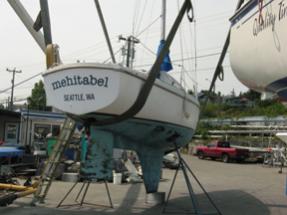 We had her name repainted by hand - nicely done by Jim Noonan from the &quot;dot&quot; paintedwallmurals &quot;dot&quot; com in Everett. Her rudder that you can see here looks alot different than the elevations you see for the Islander 27 online. It's big!