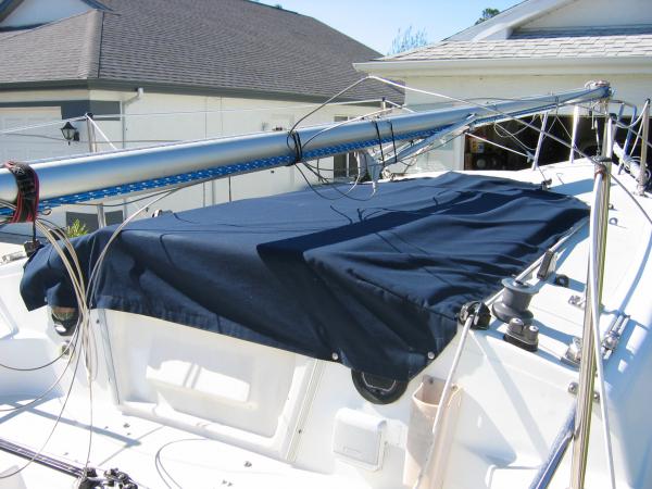 We had this cover made from Sunbrella to keep the rain from blowing into the cabin when the boat is on the trailer.