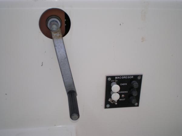 Winch handle and OEM electrical panel.  Only three switches provided