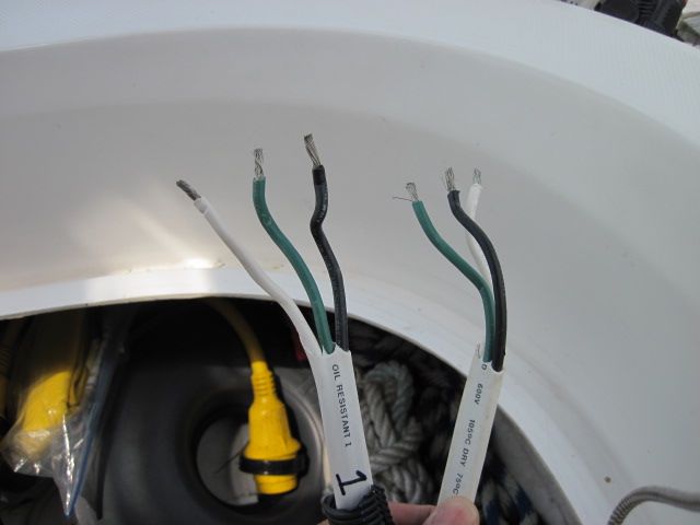 Wires exposed and ready for butt connectors.