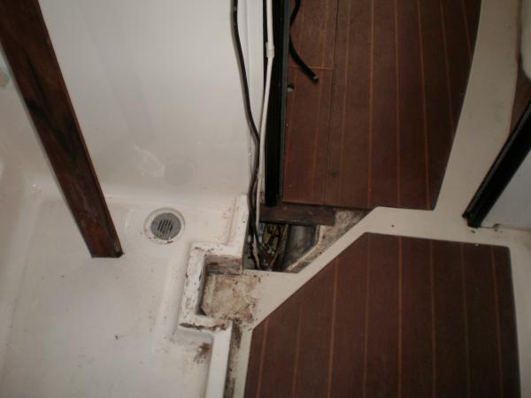 Wood Mast post removed.  Water damage from shower water or mast step