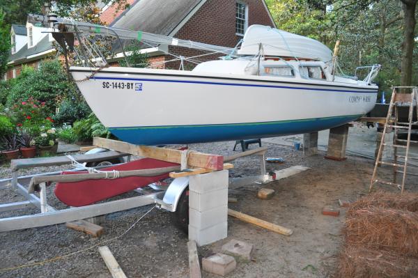 Working on bottom painting and the keel in our yard.